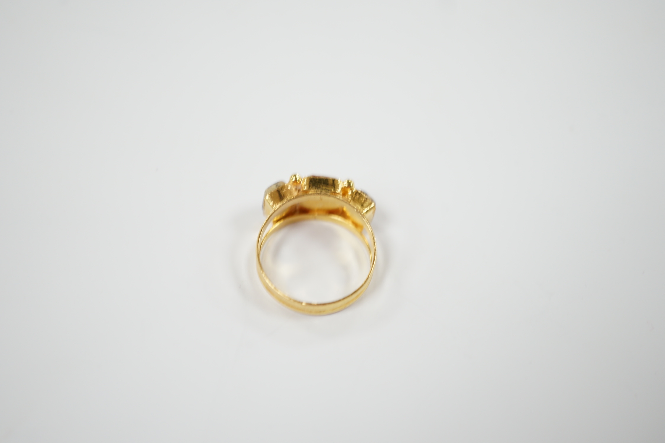 A continental yellow metal (stamped 875) and three stone hardstone set ring, size Q, gross weight 5 grams.